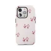 Noeuds à breloques rosés